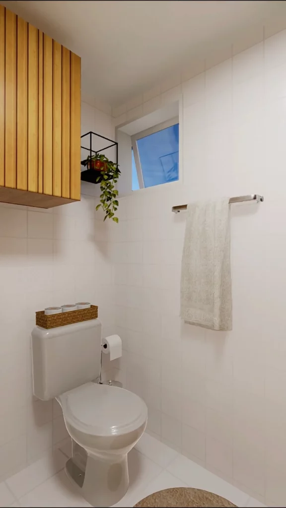 Cesto organizador em cima do vaso sanitário, gancho com toalha e planta trepadeira na parede.