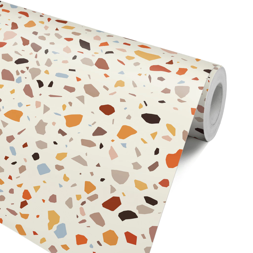 Papel de parede que imita granilite no rolo.