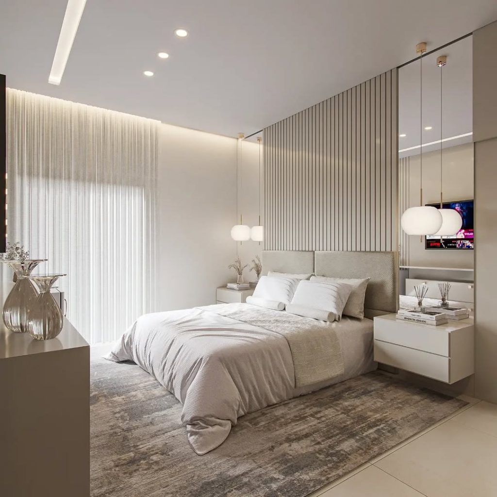 Quarto minimalista cinza com grandes arandelas redondas nas laterais da cama.