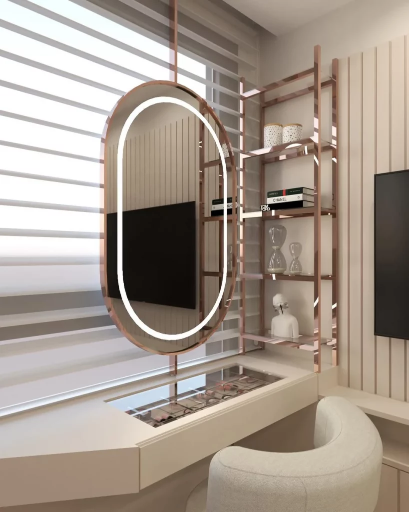 Penteadeira com LED e espelho oval, detalhes metálicos rose gold.
