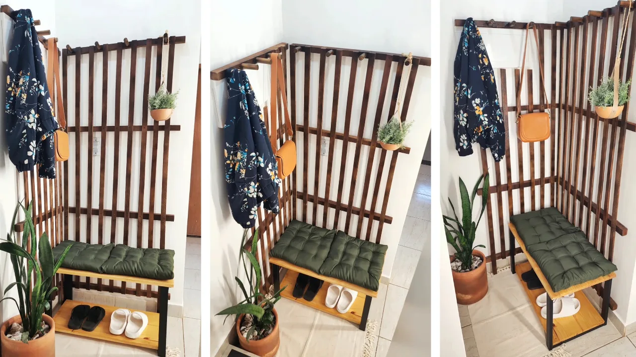 Solução para disfarçar quadro de energia feita de madeira, com banco sapateira, casaco e vaso de planta.